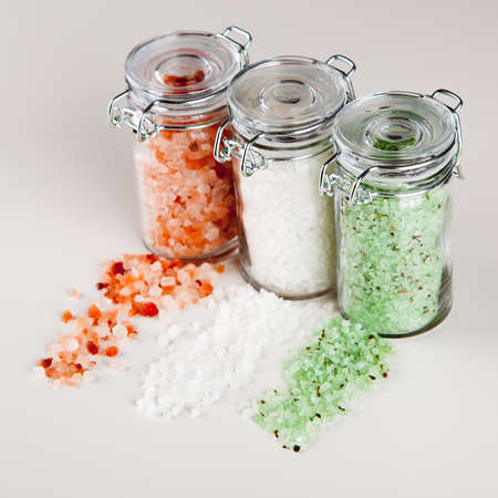 Different types of cooking salt on white backgroundの写真素材