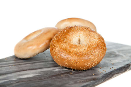 Bagels on gray marble background