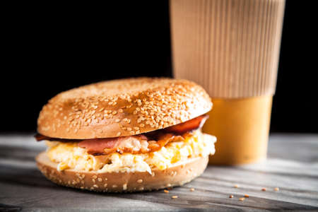 Bagel with bacon and egg for breakfast
