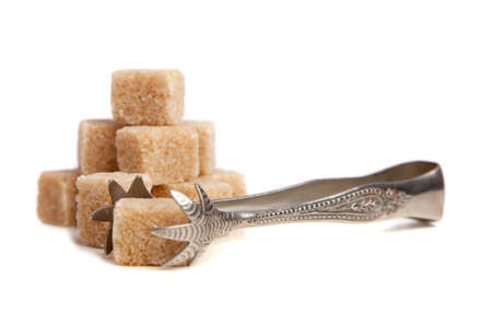 Brown sugar cubes isolated on white backoundの写真素材