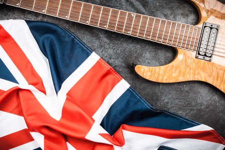Electric guitar and British flag on grey backgroundの写真素材