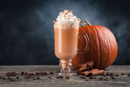 Pumpkin spice latte on dark backgroundの写真素材