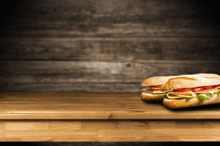 Panini sandwiches on wooden tableの写真素材
