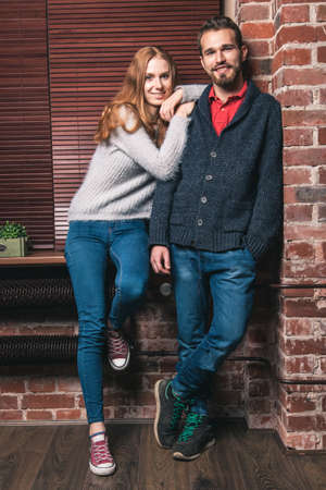 Young couple in their loft style apartmentの写真素材