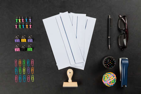 Office supplies on leather surface tableの写真素材