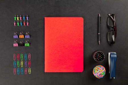 Office supplies on leather surface tableの写真素材