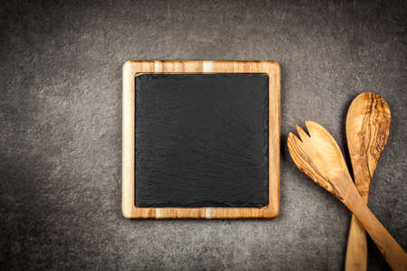 Slate board in a wooden frameの写真素材