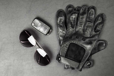 Car keys and driving gloves