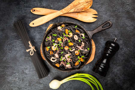 Black spaghetti with seafoodの写真素材