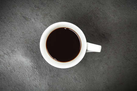 Top view of a coffee cup on slate backgroundの写真素材