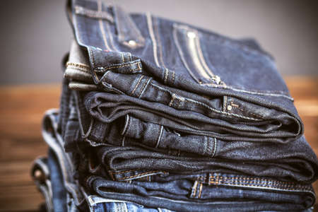 Pile of jeansの写真素材