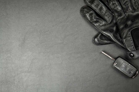 Car keys and driving gloves