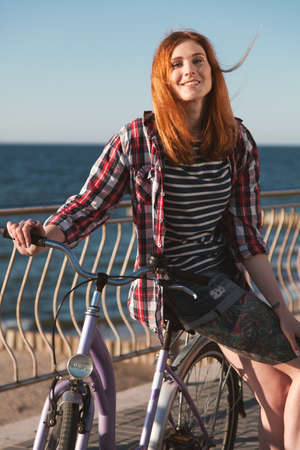 Young woman on a bicycleの写真素材