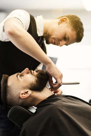 Professional barber doing a haircut