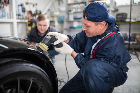 Sports car in a workshopの写真素材