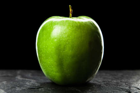 Apple on dark backgroundの写真素材