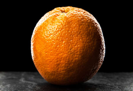 Orange on dark backgroundの写真素材