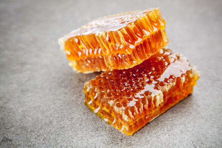 Honeycomb on grey backgroundの写真素材