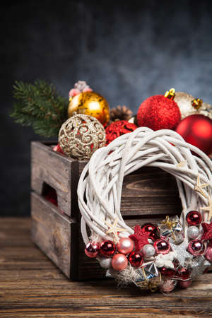 Christmas ornaments in a wooden crateの写真素材