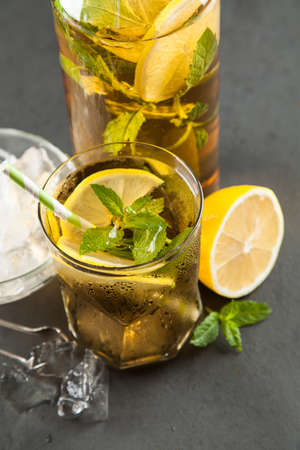 Ice tea with lemon and mintの写真素材