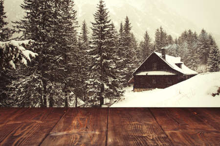Table on winter mountains backgroundの写真素材
