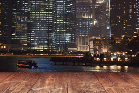 Table on night city background