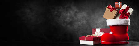 Santas shoe on dark backgroundの写真素材