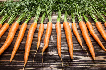 Carrot on wooden table