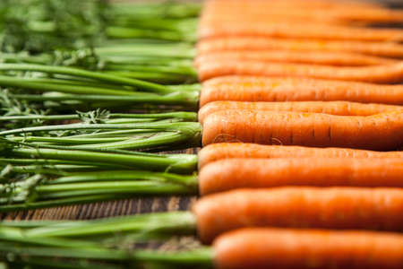 Carrot on wooden table