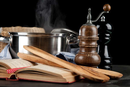 Steaming pot on black backgroundの写真素材