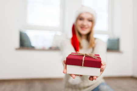 Teenage girl with Christmas presents