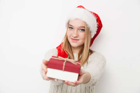 Teenage girl with Christmas presents