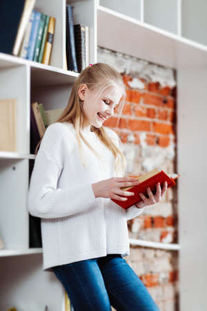 Teenage girl in a library