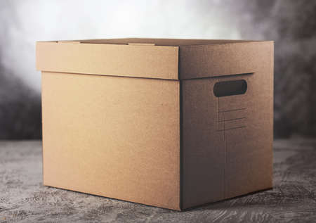 Cardboard box on grey backgroundの写真素材