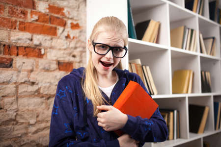Teenage girl in a library