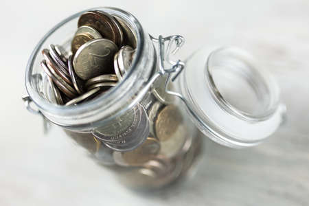 Coins in a glass jar