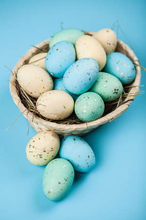 Easter eggs on blue backgroundの写真素材