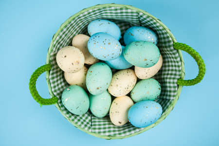 Easter eggs on blue backgroundの写真素材