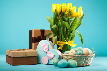 Yellow tulips on blue backgroundの写真素材