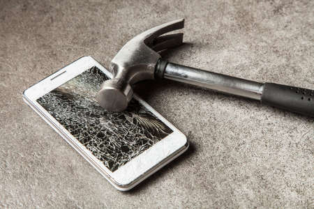 Smartphone with broken screenの写真素材
