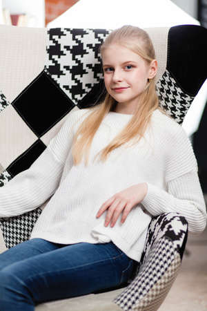 Teenage girl in a libraryの写真素材