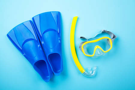 Blue flippers on color backgroundの写真素材