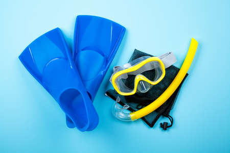 Blue flippers on color backgroundの写真素材