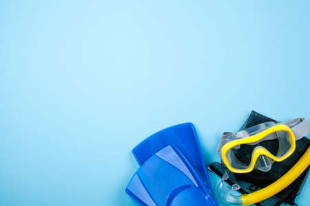 Blue flippers on color backgroundの写真素材