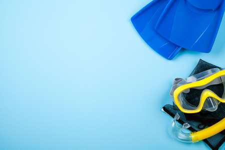 Blue flippers on color backgroundの写真素材