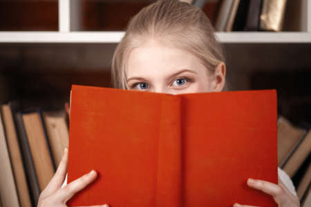 Teenage girl in a library