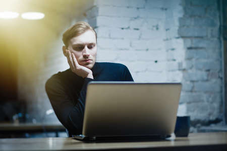 Young man with a laptop