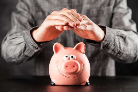 Piggy bank on black backgroundの写真素材