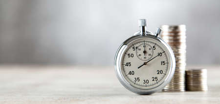 Analog stopwatch on grey background
