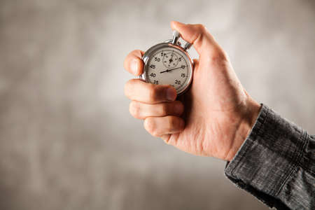 Analog stopwatch on black backgroundの写真素材